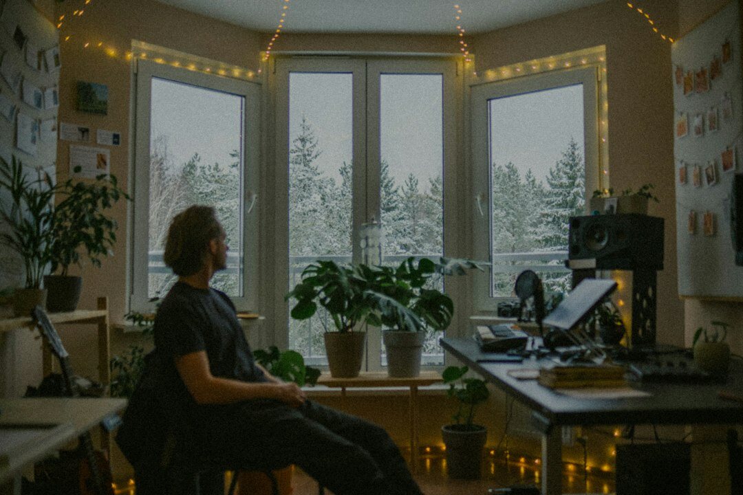 person meditating in quiet office